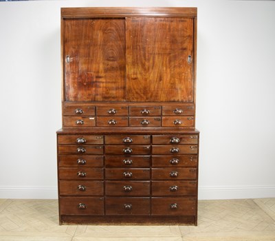 Lot 2306 - A stained wood haberdashery cabinet, the upper...