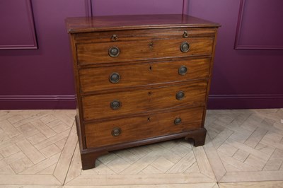 Lot 2331 - A George III mahogany chest, with brush slide...