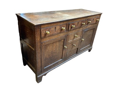 Lot 2238 - A George III oak dresser base, with three...