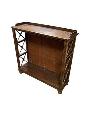 Lot 2345 - A Regency style mahogany dwarf open bookcase,...