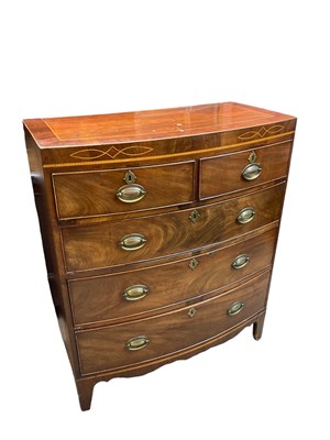Lot 2347 - A Regency inlaid mahogany bowfront chest, with...