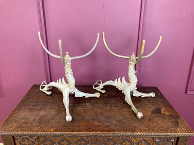Lot 2213 - A pair of brass table bases, modelled as...