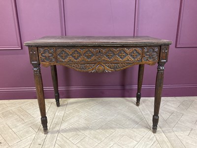 Lot 2239 - A Victorian carved oak hall or side table,...