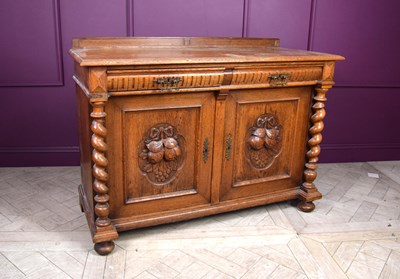 Lot 2266 - A late 19th century French light oak dresser...