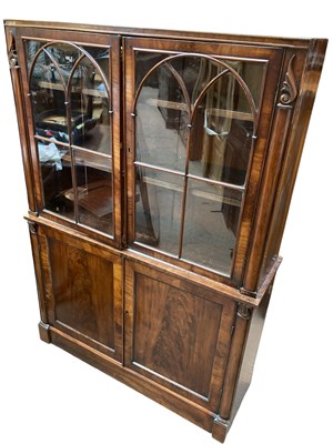 Lot 2367 - A Regency mahogany bookcase, with two astragal...