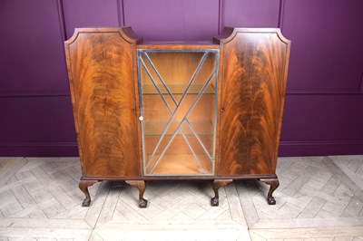 Lot 2207 - An Art Deco walnut cabinet, with central...