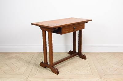 Lot 2263 - A carved light oak Gothic table, with drawer,...