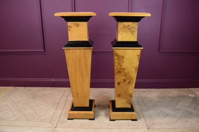 Lot 2324 - A pair of modern walnut columns of tapering...