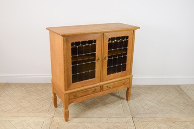 Lot 2300 - An Aesthetic style oak cabinet, height 109cm,...