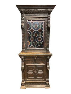Lot 2269 - A Victorian carved oak slender cabinet, with...
