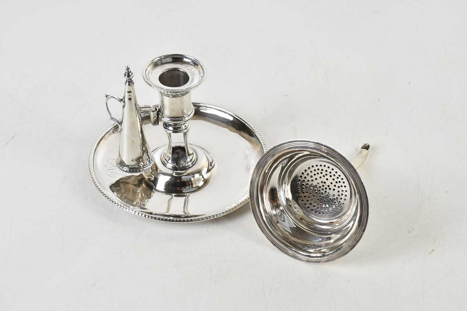 Lot 31 - A George III hallmarked silver chamberstick...