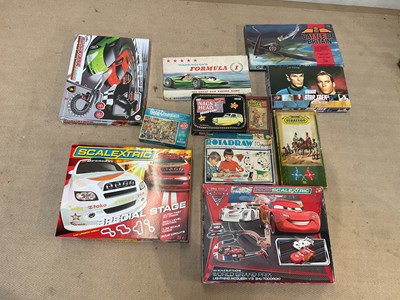 Lot 159 - A collection of table top racing games, board...