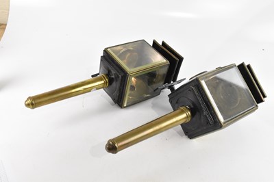Lot 2523 - A pair of 19th century brass and black painted...
