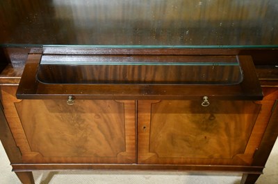 Lot 39 - A reproduction mahogany twin door cocktail...