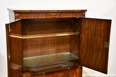 Lot 39 - A reproduction mahogany twin door cocktail...