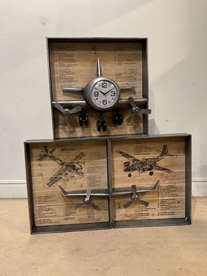 Lot 151 - A three-piece shop display clock in the form...