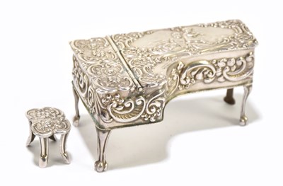 Lot 1100 - MARSTON & CO; a hallmarked silver model pianoforte