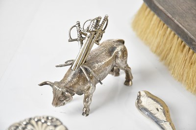 Lot 115 - A Continental white metal toothpick holder...
