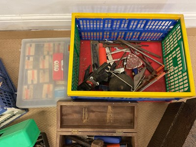 Lot 42 - A quantity of tools and two storage containers,...