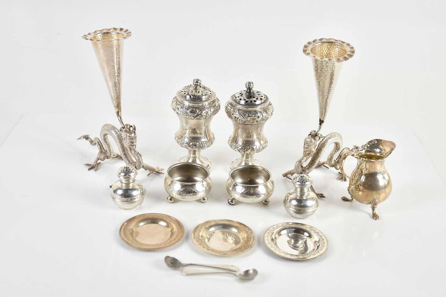 Lot 69 - A pair of Chinese white metal bud vases,...