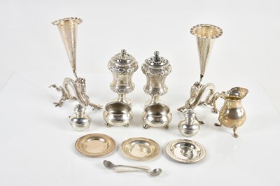 Lot 69 - A pair of Chinese white metal bud vases,...