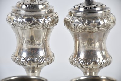 Lot 69 - A pair of Chinese white metal bud vases,...