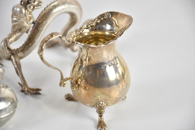 Lot 69 - A pair of Chinese white metal bud vases,...