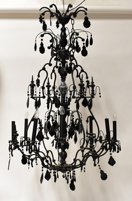 Lot 158 - A large ornate contemporary black painted and...