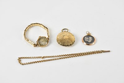 Lot 1639 - A 9ct yellow gold mounted locket, a 9ct curb...