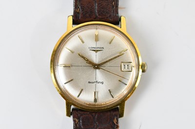 Lot 1887 - LONGINES; a gentleman's yellow metal cased...