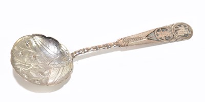 Lot 1164 - A Chinese white metal caddy spoon