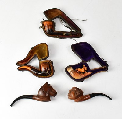 Lot 572 - Five Victorian and later pipes, comprising a...