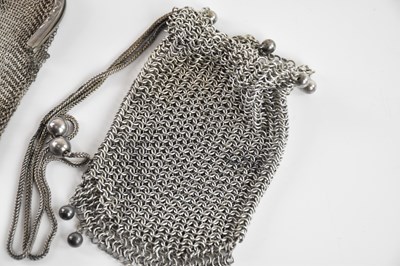 Lot 79 - Three white metal lady's mesh purses,...
