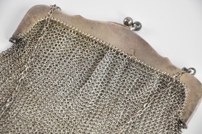 Lot 79 - Three white metal lady's mesh purses,...