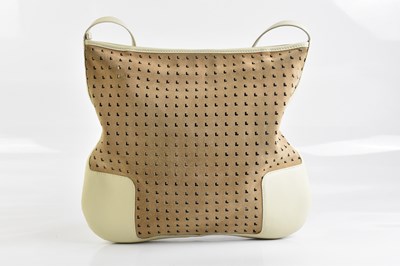 Lot 2025 - LOEWE; a cream calfskin leather and tan suede...