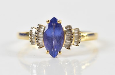 Lot 1370 - An 18ct yellow gold tanzanite and diamond ring,...