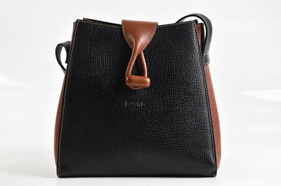 Lot 2022 - LOEWE; a black and tan pebbled leather...