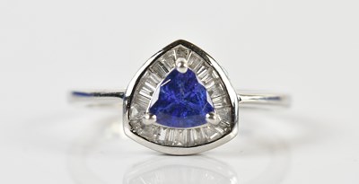 Lot 1371 - A platinum tanzanite and diamond ring, the...