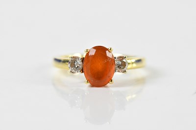 Lot 1368 - An 18ct yellow gold fire opal and diamond ring,...