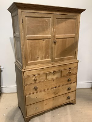 Lot 2244 - A Victorian pine press cupboard, with two...
