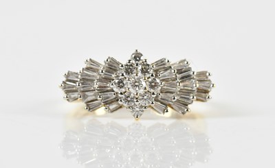 Lot 1369 - An 18ct yellow gold diamond set dress ring,...