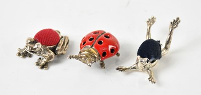 Lot 57 - Three novelty pin cushions, two modelled as...