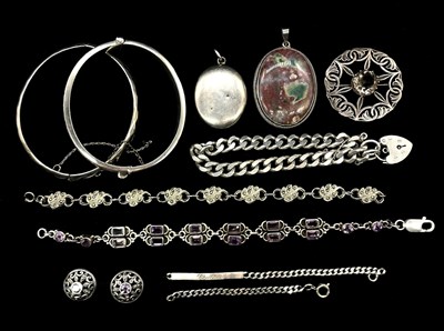 Lot 1130 - A group of silver jewellery including a...