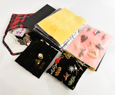 Lot 1729 - A collection of brooches and badges, including...
