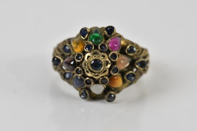 Lot 1717 - A decorative Thai colourful stone set ring,...