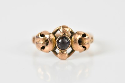 Lot 1520 - A 9ct yellow gold garnet cabochon set dress...