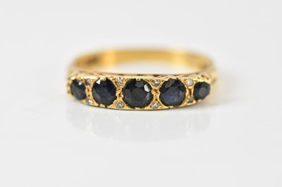 Lot 1439 - A yellow gold sapphire and diamond chip...