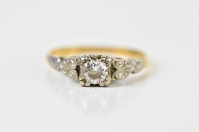 Lot 1440 - An 18ct yellow gold diamond solitaire ring,...