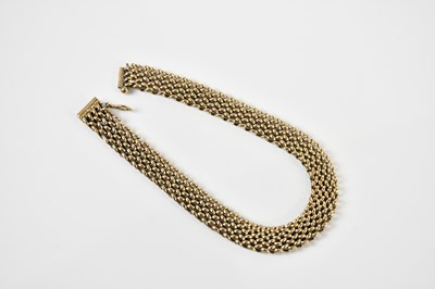 Lot 1555 - A 9ct yellow gold open link bracelet, length...
