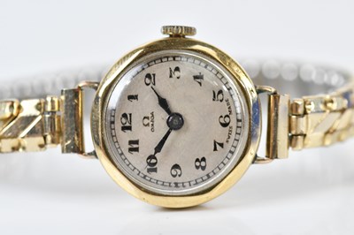 Lot 1856 - OMEGA; a lady's vintage 9ct gold wristwatch,...